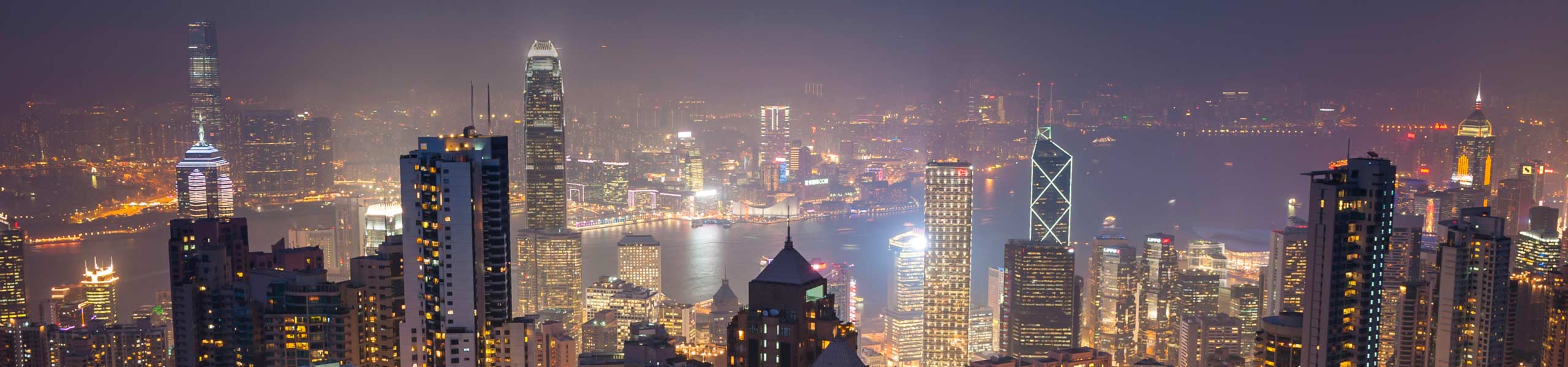 Aerial view of a smart city at night, smart buildings.